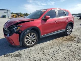 ✅ 2014 Mazda CX-5 Grand Touring • VIN: JM3KE2DY3E0376034 • Lot: 81124925. Listed on Copart with 112,912 mi. Free auction sales archive from the USA and detailed vehicle history report at DreamBid. Image 1.