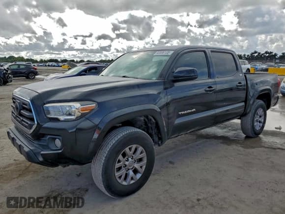 ✅ 2018 Toyota Tacoma TRD Sport • VIN: 3TMAZ5CN5JM066203 • Lot: 93886135. Listed on Copart with 83,867 mi. Free auction sales archive from the USA and detailed vehicle history report at DreamBid. Image 1.
