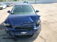 ✅ 2012 Chevrolet Sonic LTZ • VIN: 1G1JE6SH2C4211444 • Lot: 54013075. Listed on Copart with 97,378 mi. Free auction sales archive from the USA and detailed vehicle history report at DreamBid. Image 13.