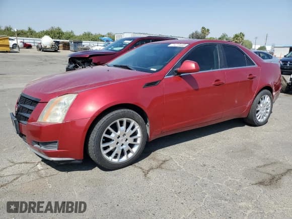 ✅ 2009 Cadillac CTS RWD • VIN: 1G6DF577190101323 • Lot: 71273405. Listed on Copart with 174,266 mi. Free auction sales archive from the USA and detailed vehicle history report at DreamBid. Image 1.