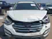2014 Hyundai Santa Fe with VIN 5XYZU3LA7EG183450, listed as a IAAI auction lot 43218232 with 102,132 mi miles and . Bid and sale history available at DreamBid. Image 6.