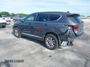 ✅ 2019 Hyundai Santa Fe SE • VIN: 5NMS23AD1KH044131 • Lot: 43237640. Wystawiony na IAAI z przebiegiem 105 619 mil. Bezpłatny archiwum sprzedaży aukcyjnych z USA i szczegółowy raport historii pojazdu na DreamBid. Zdjęcie 3.