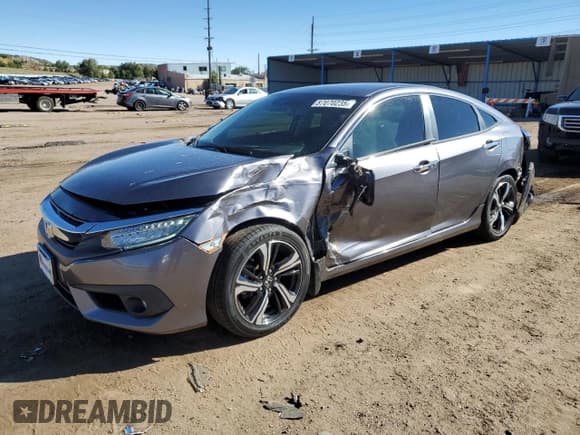✅ 2018 Honda Civic Touring • VIN: 19XFC1F95JE001392 • Lot: 87070235. Listed on Copart with 80,915 mi. Free auction sales archive from the USA and detailed vehicle history report at DreamBid. Image 1.