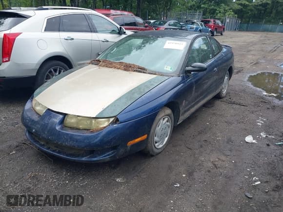 ✅ 1999 Saturn SC • VIN: 1G8ZP1284XZ348752 • Лот: 42970923. Опубликован ранее на IAAI с пробегом 178 344 миль. Бесплатный доступ к архиву аукционных продаж из США и подробный отчёт об истории автомобиля на DreamBid. Изображение 2.