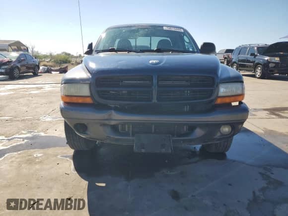2003 Dodge Dakota Sport z VIN 1D7HL32X63S218920, wystawiony jako Copart lot #76013444 z przebiegiem 142 224 mil mil oraz Czysty tytuł • Clean title. Historia ofert i sprzedaży dostępna na DreamBid. Obrazek 5.