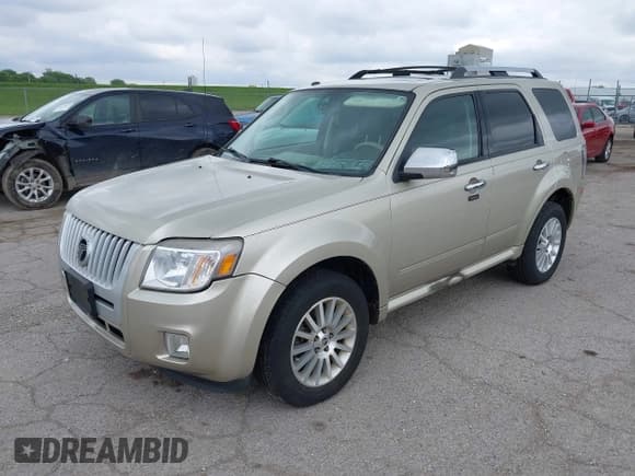 ✅ 2010 Mercury Mariner Premier • VIN: 4M2CN8HG6AKJ03051 • Lot: 42176596. Listed on IAAI with 154,041 mi. Free auction sales archive from the USA and detailed vehicle history report at DreamBid. Image 2.