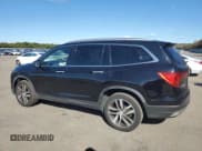 ✅ 2016 Honda Pilot Elite • VIN: 5FNYF6H03GB023891 • Lot: 82257825. Listed on Copart with 106,452 mi. Free auction sales archive from the USA and detailed vehicle history report at DreamBid. Image 2.