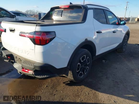 2023 Hyundai Santa Cruz SEL с VIN 5NTJCDAE1PH070330, выставлен на аукционе IAAI как лот 41095448 с пробегом 13 202 миль миль и . История ставок и продаж доступна на DreamBid. Изображение 4.