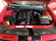 ✅ 2010 Dodge Challenger SE • VIN: 2B3CJ4DV4AH170304 • Lot: 82936933. Wystawiony na Copart z przebiegiem 142 734 mil. Bezpłatny archiwum sprzedaży aukcyjnych z USA i szczegółowy raport historii pojazdu na DreamBid. Zdjęcie 11.