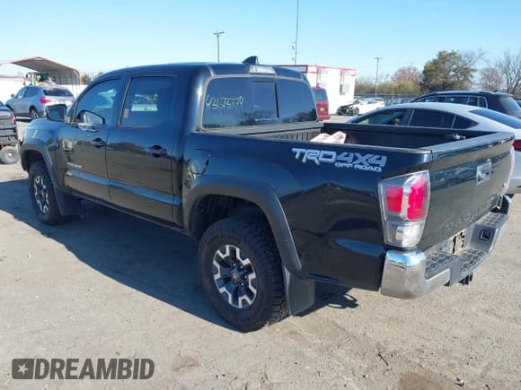 ✅ 2021 Toyota Tacoma SR • VIN: 3TMCZ5AN4MM374169 • Lot: 43673779. Listed on IAAI with 72,030 mi. Free auction sales archive from the USA and detailed vehicle history report at DreamBid. Image 3.