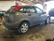 ✅ 2002 Ford Focus ZX5 • VIN: 3FAFP37352R180981 • Lot: 55856125. Listed on Copart with 59,785 mi. Free auction sales archive from the USA and detailed vehicle history report at DreamBid. Image 3.