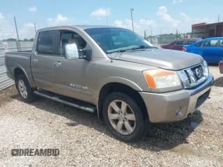 ✅ 2009 Nissan Titan LE • VIN: 1N6BA07C19N309057 • Lot: 42555255. Listed on IAAI with 246,964 mi. Free auction sales archive from the USA and detailed vehicle history report at DreamBid. Image 1.