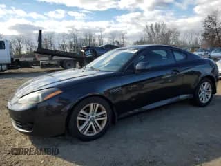 ✅ 2008 Hyundai Tiburon GS • VIN: KMHHM66D18U287952 • Лот: 93293075. Опубликован ранее на Copart с пробегом 179 609 миль. Бесплатный доступ к архиву аукционных продаж из США и подробный отчёт об истории автомобиля на DreamBid. Изображение 1.