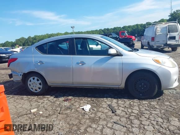 ✅ 2012 Nissan Versa SV • VIN: 3N1CN7AP9CL908895 • Лот: 42852127. Опубликован ранее на IAAI с пробегом 180 891 миль. Бесплатный доступ к архиву аукционных продаж из США и подробный отчёт об истории автомобиля на DreamBid. Изображение 13.