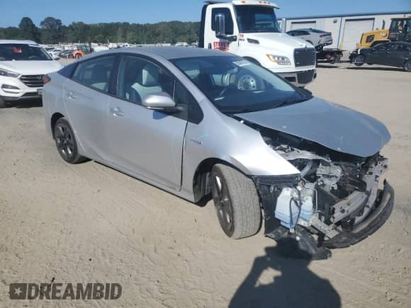 2021 Toyota Prius L Eco with VIN JTDKAMFU7M3137514, listed as a Copart auction lot 85843795 with 31,718 mi miles and Salvage title. Bid and sale history available at DreamBid. Image 4.