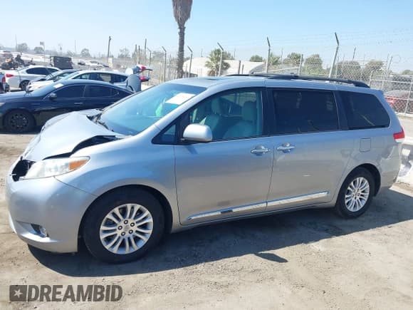 ✅ 2012 Toyota Sienna XLE AAS • VIN: 5TDYK3DC2CS178061 • Lot: 43229260. Listed on IAAI with 166,472 mi. Free auction sales archive from the USA and detailed vehicle history report at DreamBid. Image 14.