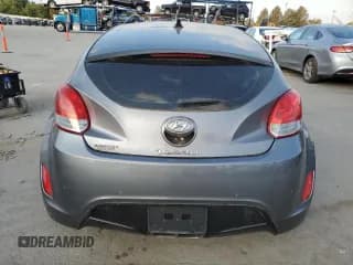 ✅ 2013 Hyundai Veloster w/Gray Int • VIN: KMHTC6AD9DU160820 • Lot: 70059004. Wystawiony na Copart z przebiegiem Nie podano. Bezpłatny archiwum sprzedaży aukcyjnych z USA i szczegółowy raport historii pojazdu na DreamBid. Zdjęcie 6.