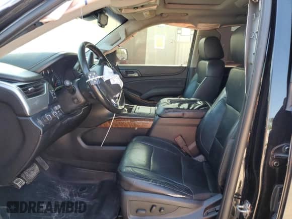 2015 Chevrolet Tahoe LTZ with VIN 1GNSKCKC6FR170659, listed as a Copart auction lot 69412835 with 252,198 mi miles and Salvage title. Bid and sale history available at DreamBid. Image 7.