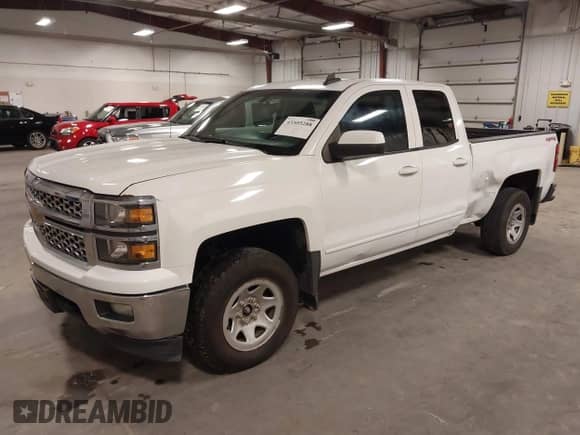 2015 Chevrolet Silverado 1500 LT z VIN 1GCVKREC8FZ159568, wystawiony jako IAAI lot #43505288 z przebiegiem 192 373 mil mil oraz . Historia ofert i sprzedaży dostępna na DreamBid. Obrazek 18.