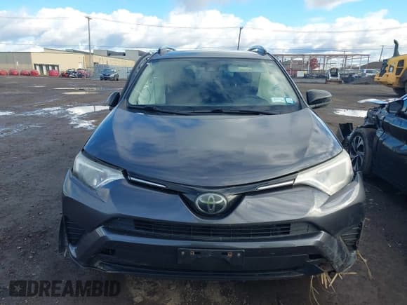 ✅ 2018 Toyota RAV4 LE • VIN: JTMBFREV8JJ729942 • Lot: 43557394. Listed on IAAI with 108,053 mi. Free auction sales archive from the USA and detailed vehicle history report at DreamBid. Image 12.