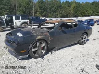 2012 Dodge Challenger SRT-8 392 с VIN 2C3CDYCJ3CH170605, выставлен на аукционе Copart как лот 82395875 с пробегом Не указан миль и На запчасти • Non repairable. История ставок и продаж доступна на DreamBid. Изображение 1.