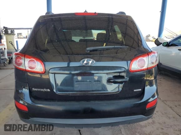 ✅ 2012 Hyundai Santa Fe GLS • VIN: 5XYZGDAB4CG155854 • Lot: 70053684. Listed on Copart with 251,318 mi. Free auction sales archive from the USA and detailed vehicle history report at DreamBid. Image 6.