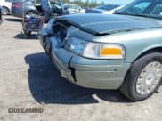 ✅ 2005 Ford Crown Victoria Standard • VIN: 2FAFP73W05X118255 • Lot: 42112937. Listed on IAAI with 71,481 mi. Free auction sales archive from the USA and detailed vehicle history report at DreamBid. Image 13.