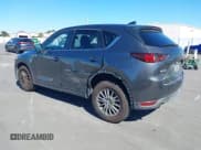 ✅ 2017 Mazda CX-5 Touring • VIN: JM3KFACL4H0136878 • Lot: 43606656. Wystawiony na IAAI z przebiegiem 137 446 mil. Bezpłatny archiwum sprzedaży aukcyjnych z USA i szczegółowy raport historii pojazdu na DreamBid. Zdjęcie 3.
