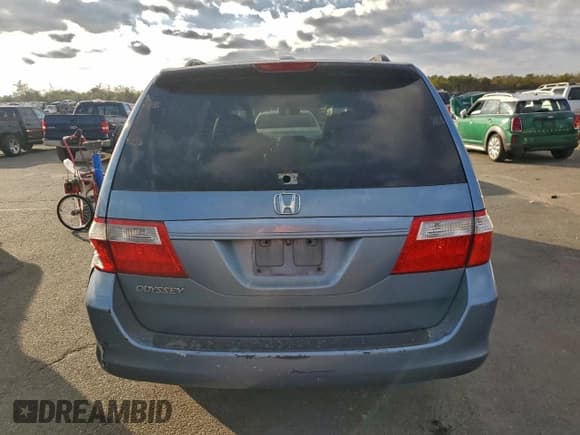 ✅ 2006 Honda Odyssey EX-L • VIN: 5FNRL38776B070297 • Лот: 95570655. Опубликован ранее на Copart с пробегом 124 763 миль. Бесплатный доступ к архиву аукционных продаж из США и подробный отчёт об истории автомобиля на DreamBid. Изображение 6.