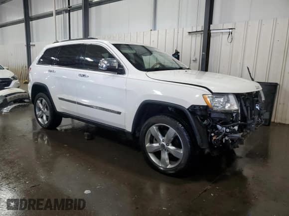 ✅ 2012 Jeep Grand Cherokee Overland • VIN: 1C4RJFCG7CC324310 • Lot: 84262345. Listed on Copart with 155,354 mi. Free auction sales archive from the USA and detailed vehicle history report at DreamBid. Image 4.