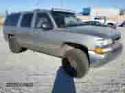 2000 Chevrolet Suburban LS с VIN 3GNEC16TXYG190988, выставлен на аукционе Copart как лот 80372284 с пробегом 152 279 миль миль и Списание • Salvage title. История ставок и продаж доступна на DreamBid. Изображение 4.