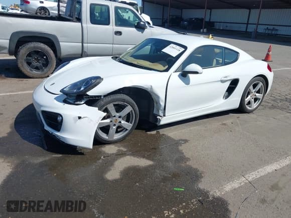 ✅ 2015 Porsche Cayman • VIN: WP0AA2A86FK163282 • Lot: 42001118. Listed on IAAI with 101,495 mi. Free auction sales archive from the USA and detailed vehicle history report at DreamBid. Image 23.