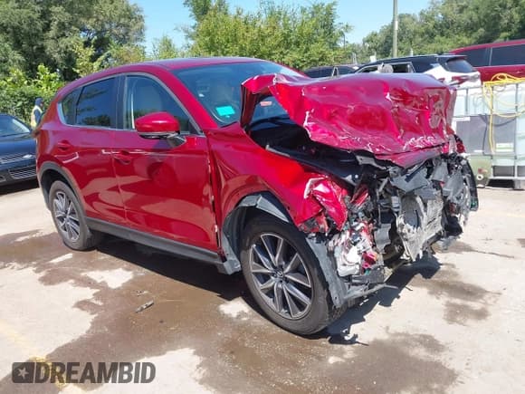 ✅ 2018 Mazda CX-5 Touring • VIN: JM3KFBCM7J0444602 • Lot: 43083220. Listed on IAAI with 77,993 mi. Free auction sales archive from the USA and detailed vehicle history report at DreamBid. Image 1.