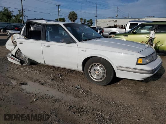 ✅ 1996 Oldsmobile Cutlass Ciera 1SA VX5 • VIN: 1G3AJ55M5T6394526 • Lot: 72783674. Wystawiony na Copart z przebiegiem 77 988 mil. Bezpłatny archiwum sprzedaży aukcyjnych z USA i szczegółowy raport historii pojazdu na DreamBid. Zdjęcie 4.