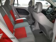 ✅ 2007 Dodge Caliber SXT • VIN: 1B3HB48B57D170501 • Лот: 87200974. Опубликован ранее на Copart с пробегом 166 019 миль. Бесплатный доступ к архиву аукционных продаж из США и подробный отчёт об истории автомобиля на DreamBid. Изображение 11.