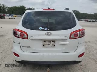 ✅ 2012 Hyundai Santa Fe GLS • VIN: 5XYZG3AB6CG157258 • Lot: 54052354. Listed on Copart with 223,325 mi. Free auction sales archive from the USA and detailed vehicle history report at DreamBid. Image 6.