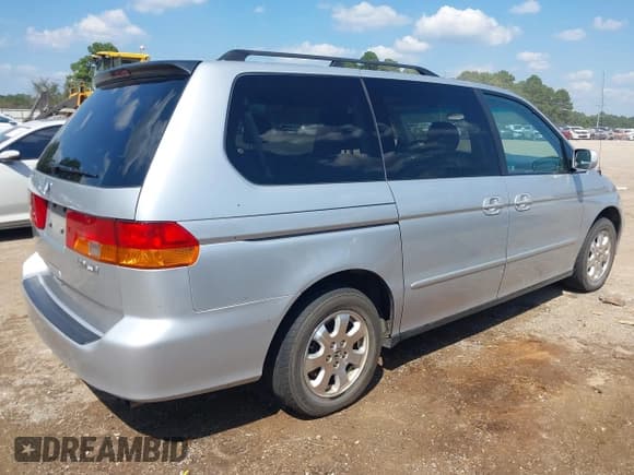 ✅ 2004 Honda Odyssey EX-L • VIN: 5FNRL18074B011223 • Lot: 43203727. Wystawiony na IAAI z przebiegiem 219 053 mil. Bezpłatny archiwum sprzedaży aukcyjnych z USA i szczegółowy raport historii pojazdu na DreamBid. Zdjęcie 4.