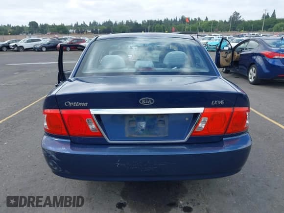 ✅ 2005 Kia Optima LX • VIN: KNAGD128455390068 • Lot: 42466140. Listed on IAAI with 128,832 mi. Free auction sales archive from the USA and detailed vehicle history report at DreamBid. Image 16.