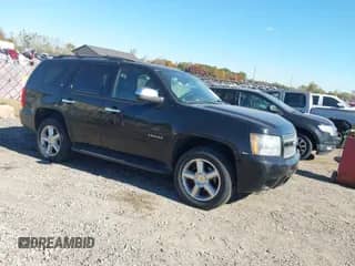 2011 Chevrolet Tahoe LT z VIN 1GNSKBE08BR282286, wystawiony jako IAAI lot #43467008 z przebiegiem 165 515 mil mil oraz . Historia ofert i sprzedaży dostępna na DreamBid. Obrazek 1.