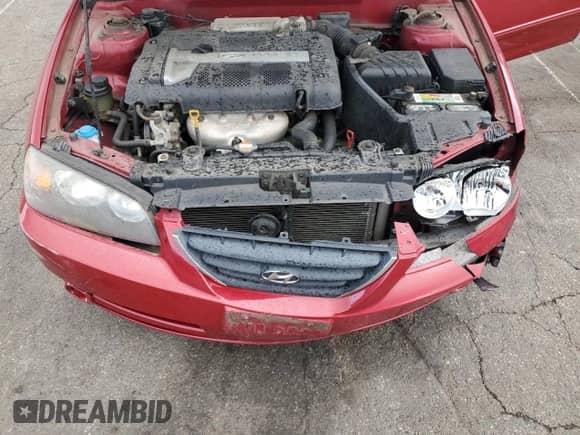 2005 Hyundai Elantra GLS z VIN KMHDN46DX5U016531, wystawiony jako Copart lot #76268804 z przebiegiem 105 467 mil mil oraz Szkoda całkowita • Salvage title. Historia ofert i sprzedaży dostępna na DreamBid. Obrazek 12.