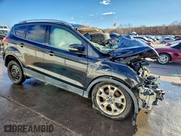✅ 2015 Ford Escape Titanium • VIN: 1FMCU9J99FUA31408 • Lot: 91243825. Listed on Copart with Not provided. Free auction sales archive from the USA and detailed vehicle history report at DreamBid. Image 4.