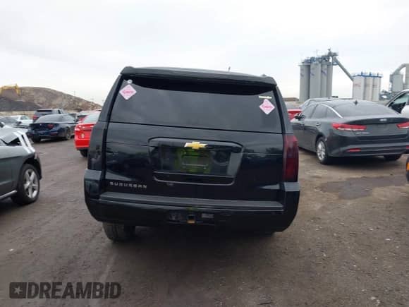 2018 Chevrolet Suburban LS z VIN 1GNSKGKCXJR264351, wystawiony jako IAAI lot #42365399 z przebiegiem 69 704 mil mil oraz . Historia ofert i sprzedaży dostępna na DreamBid. Obrazek 16.