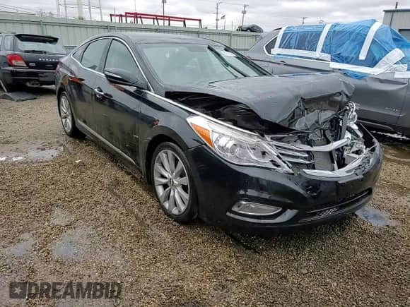 2014 Hyundai Azera Limited с VIN KMHFH4JG4EA346507, выставлен на аукционе Copart как лот 82012574 с пробегом 74 208 миль миль и Списание • Salvage title. История ставок и продаж доступна на DreamBid. Изображение 13.