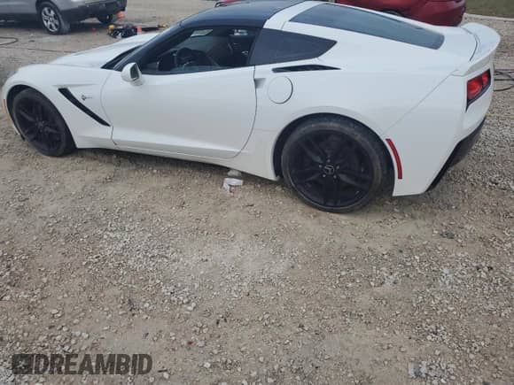 2014 Chevrolet Corvette Z51 3LT z VIN 1G1YM2D73E5105712, wystawiony jako Copart lot #79658014 z przebiegiem 19 347 mil mil oraz Szkoda całkowita • Salvage title. Historia ofert i sprzedaży dostępna na DreamBid. Obrazek 2.