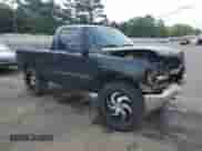 2002 Chevrolet Silverado 1500 LS with VIN 1GCEK14T72Z106860, listed as a Copart auction lot 54909765 with 301,431 mi miles and Salvage title. Bid and sale history available at DreamBid. Image 4.