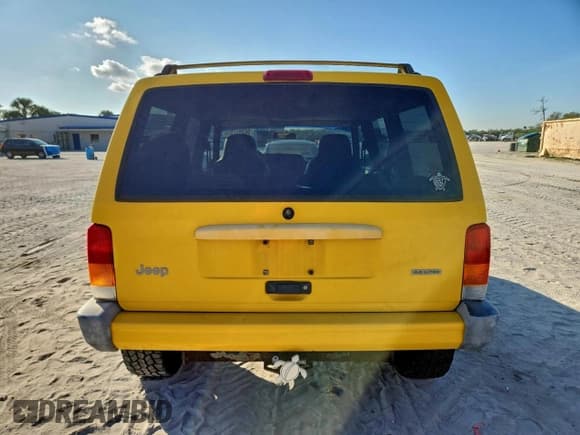 ✅ 2001 Jeep Cherokee Sport • VIN: 1J4FF48S61L585845 • Lot: 94385795. Listed on Copart with 110,014 mi. Free auction sales archive from the USA and detailed vehicle history report at DreamBid. Image 6.