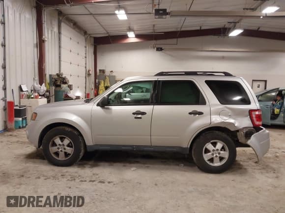 ✅ 2010 Ford Escape XLT • VIN: 1FMCU0D72AKD21628 • Lot: 43529971. Listed on IAAI with 191,450 mi. Free auction sales archive from the USA and detailed vehicle history report at DreamBid. Image 14.