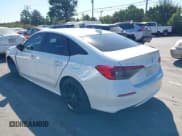 ✅ 2022 Honda Civic Sport • VIN: 2HGFE2F5XNH512587 • Lot: 43413652. Listed on IAAI with 65,352 mi. Free auction sales archive from the USA and detailed vehicle history report at DreamBid. Image 3.