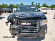 ✅ 2021 GMC Canyon 4WD AT4 • VIN: 1GTG6FEN1M1103173 • Lot: 65282525. Listed on Copart with 58,829 mi. Free auction sales archive from the USA and detailed vehicle history report at DreamBid. Image 5.