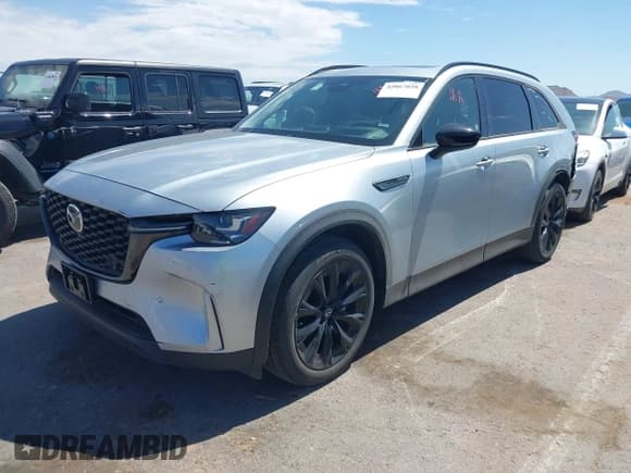 ✅ 2025 Mazda CX-90 Premium Sport • VIN: JM3KKCHD5S1229127 • Lot: 42867028. Listed on IAAI with 2,636 mi. Free auction sales archive from the USA and detailed vehicle history report at DreamBid. Image 2.